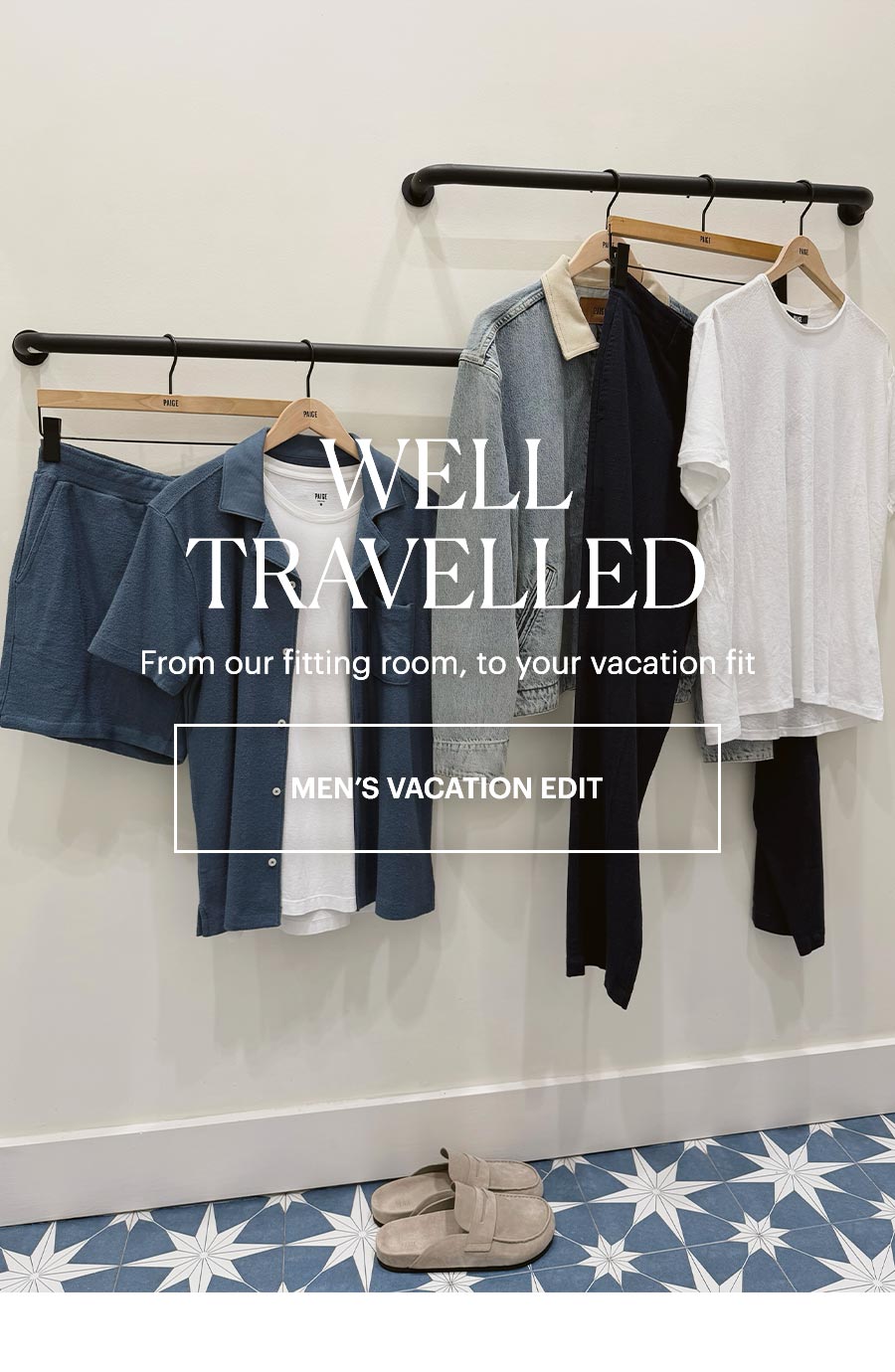 Well Travelled - From our fitting room, to your vacation fit. Featuring an image of various PAIGE men's summer items hanging in a dressing room. Shop Men's Vacation Edit.