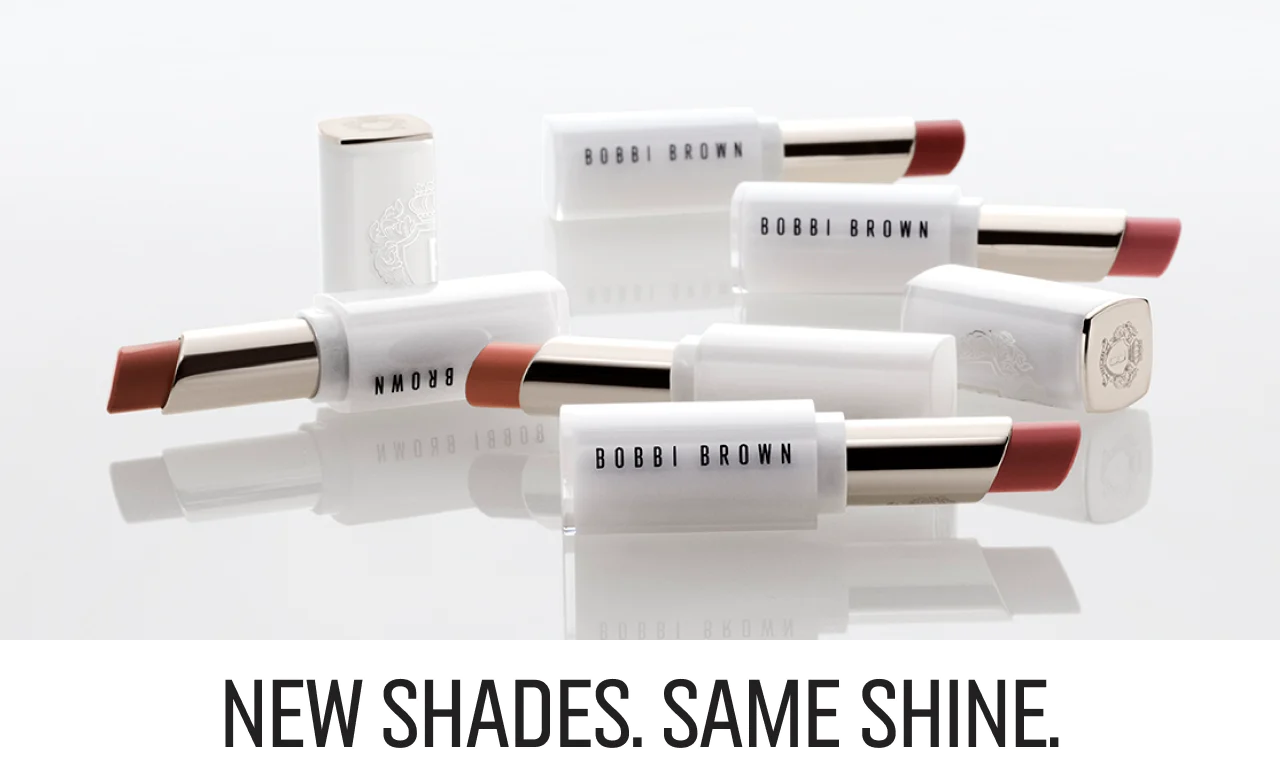 Variety of Bobbi Brown Extra Colour Shine Lipsticks, with text New Shades Same Shine.