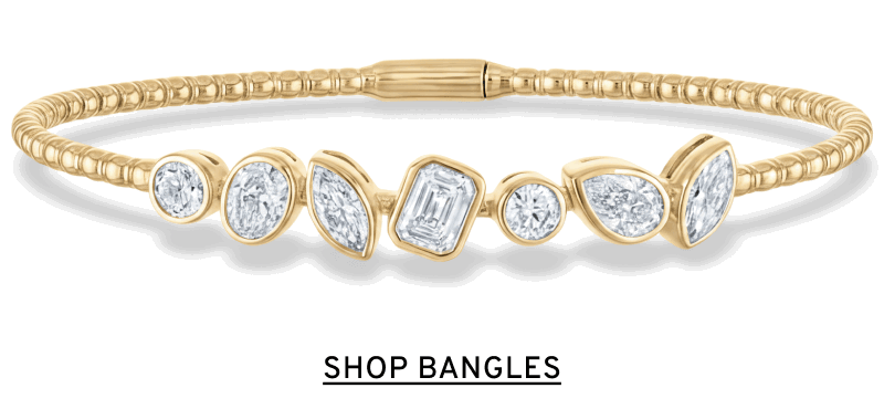 Gold and gemstone bangles. Click to Shop Bangles