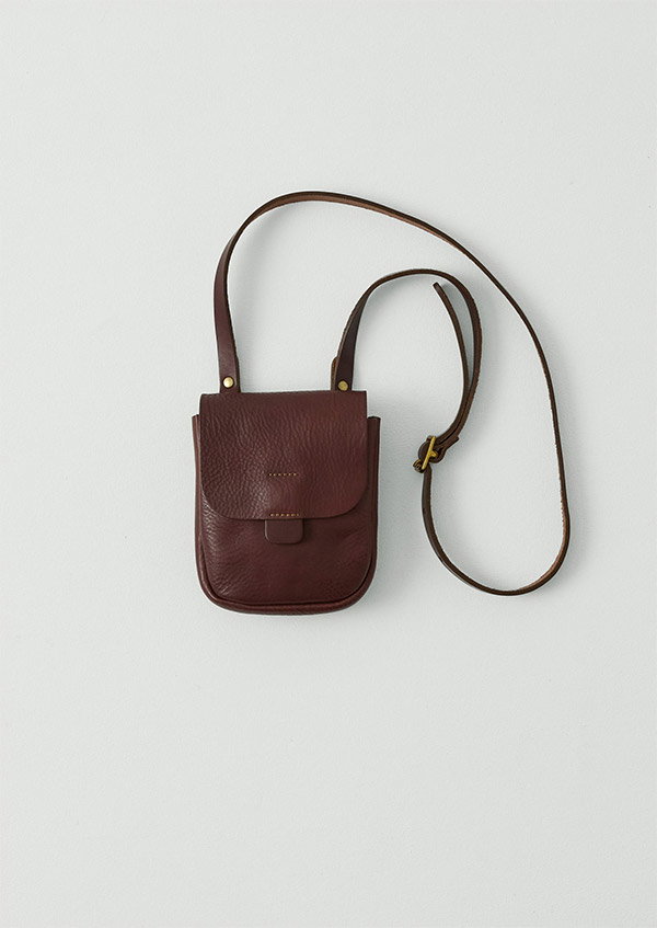 Kate Sheridan Leather Half Orbed Tab Bag