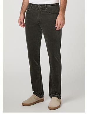 A man's legs wearing dark grey corduroy pants.