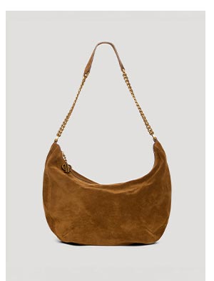 Tan suede leather handbag with gold metal hardware.