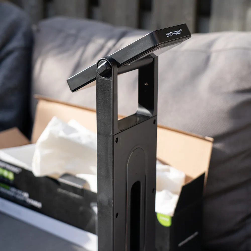 A close-up of the Alton Solar LED garden light, showing the adjustable solar panel. The solar panel can be easily adjusted to capture sunlight effectively, ensuring that the built-in battery is charged efficiently and that the light comes on automatically in the evening.
