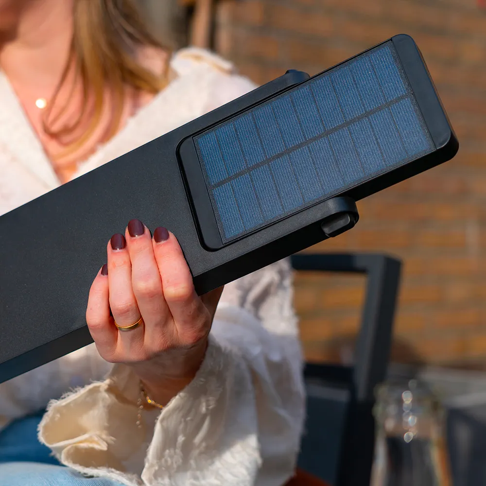 A close-up of the Alton Solar LED garden light, showing the adjustable solar panel. The solar panel can be easily adjusted to capture sunlight effectively, ensuring that the built-in battery is charged efficiently and that the light comes on automatically in the evening.