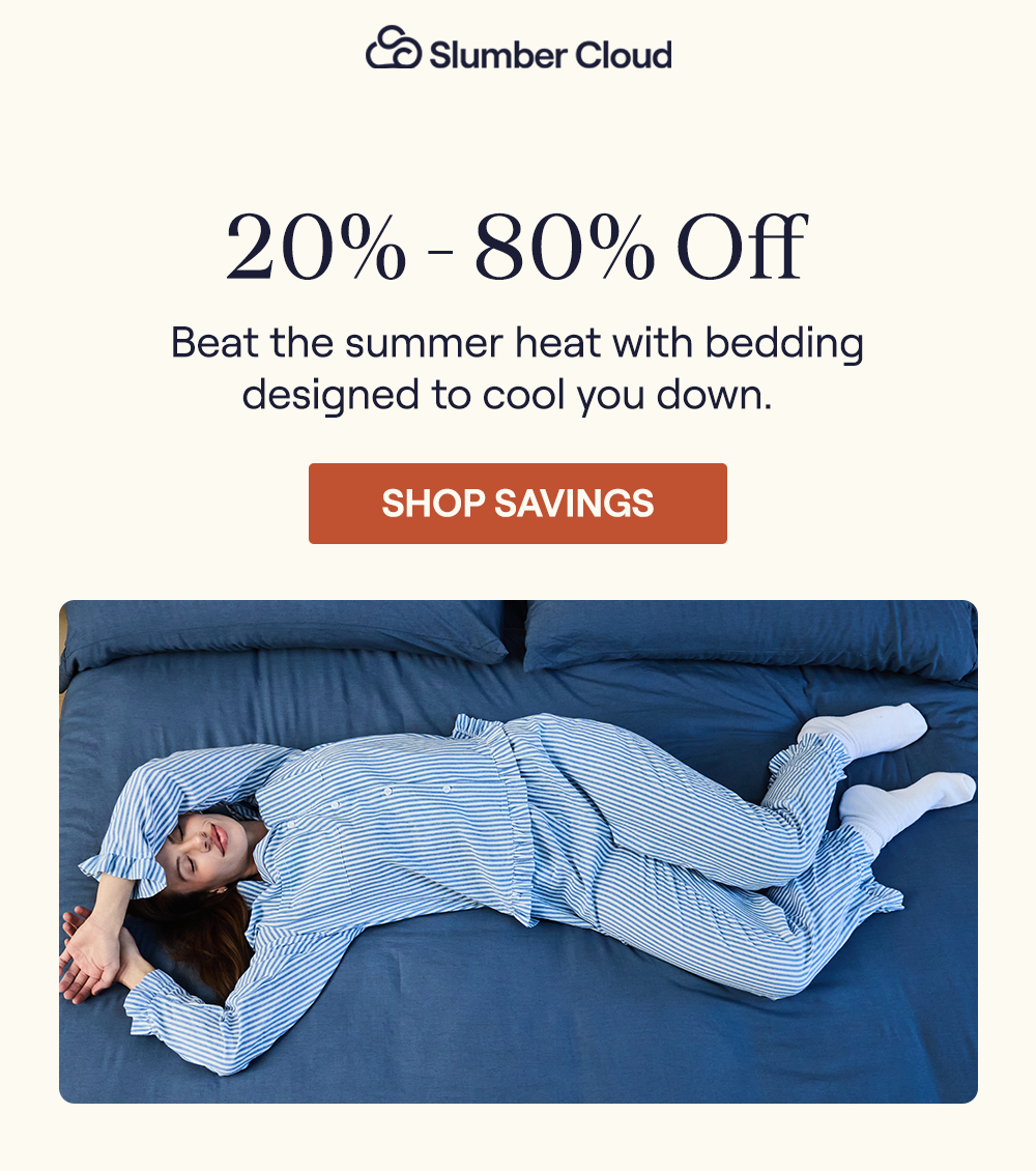 Woman laying on a bed with the Harbor Align Sheet Set