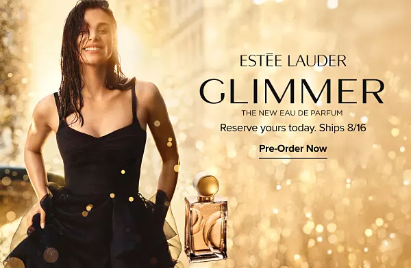 A woman and a perfume bottle. New Estee Lauder Glimmer. The new Eau de Parfum. Reserve yours today. Ships August 16th.
