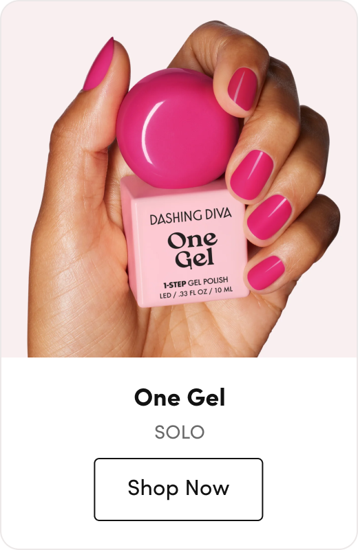Hand holding a round magenta gel polish bottle labeled 