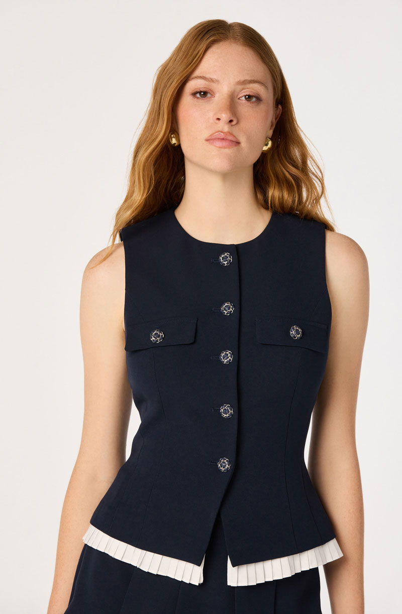 Woman Wearing Pleated-Hem Button Vest