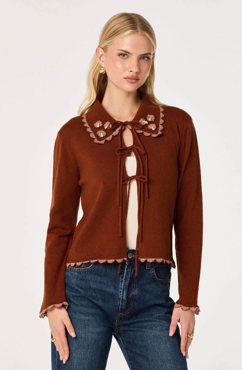 Woman Wearing Beaded Scallop-Trim Cardigan