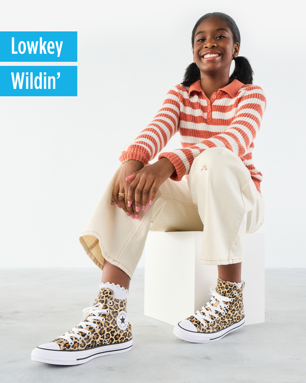 Lowkey Wildin' | Lifestyle Image of Animal Print Converse Sneakers