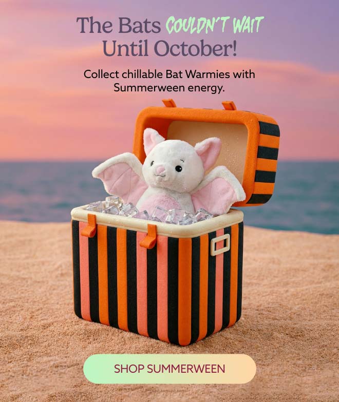 White Bat Warmies in a cooler on a beach. Shop Summerween
