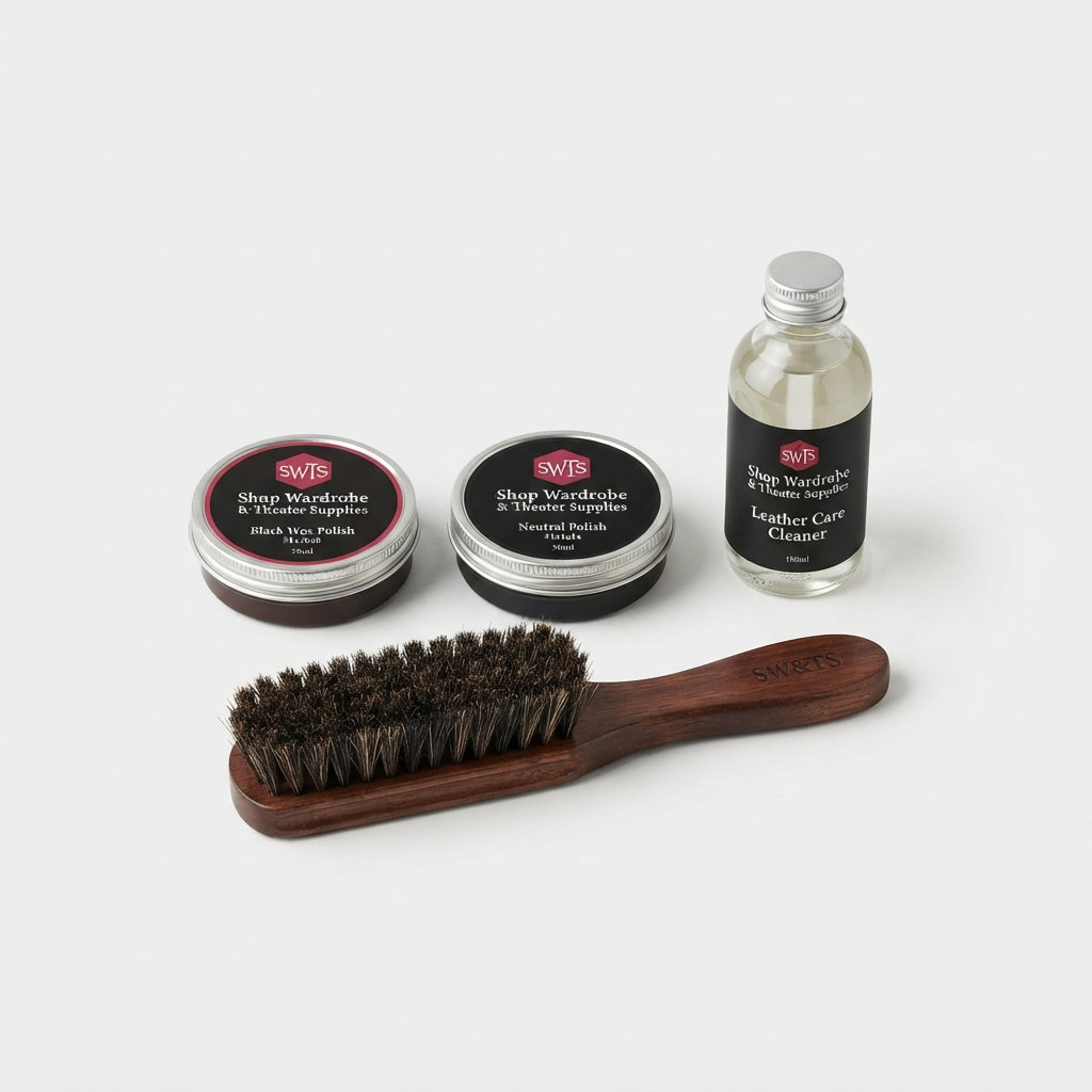 Crisp studio product photograph of premium shoe polish tins, leather care cleaner, and polishing horsehair brush on pure white background