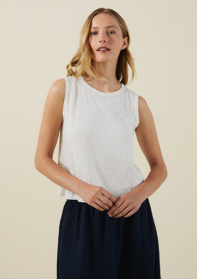 Image shows a model wearing the Ambria Top in Beach.