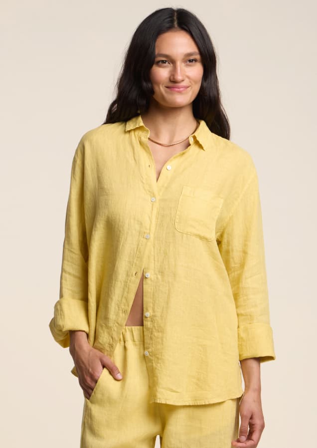 Image shows a model wearing the Mulholland Top in Sun.