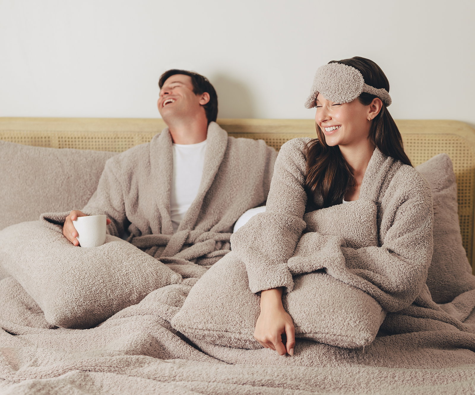 Image of couple in bed wearing Mink Robes