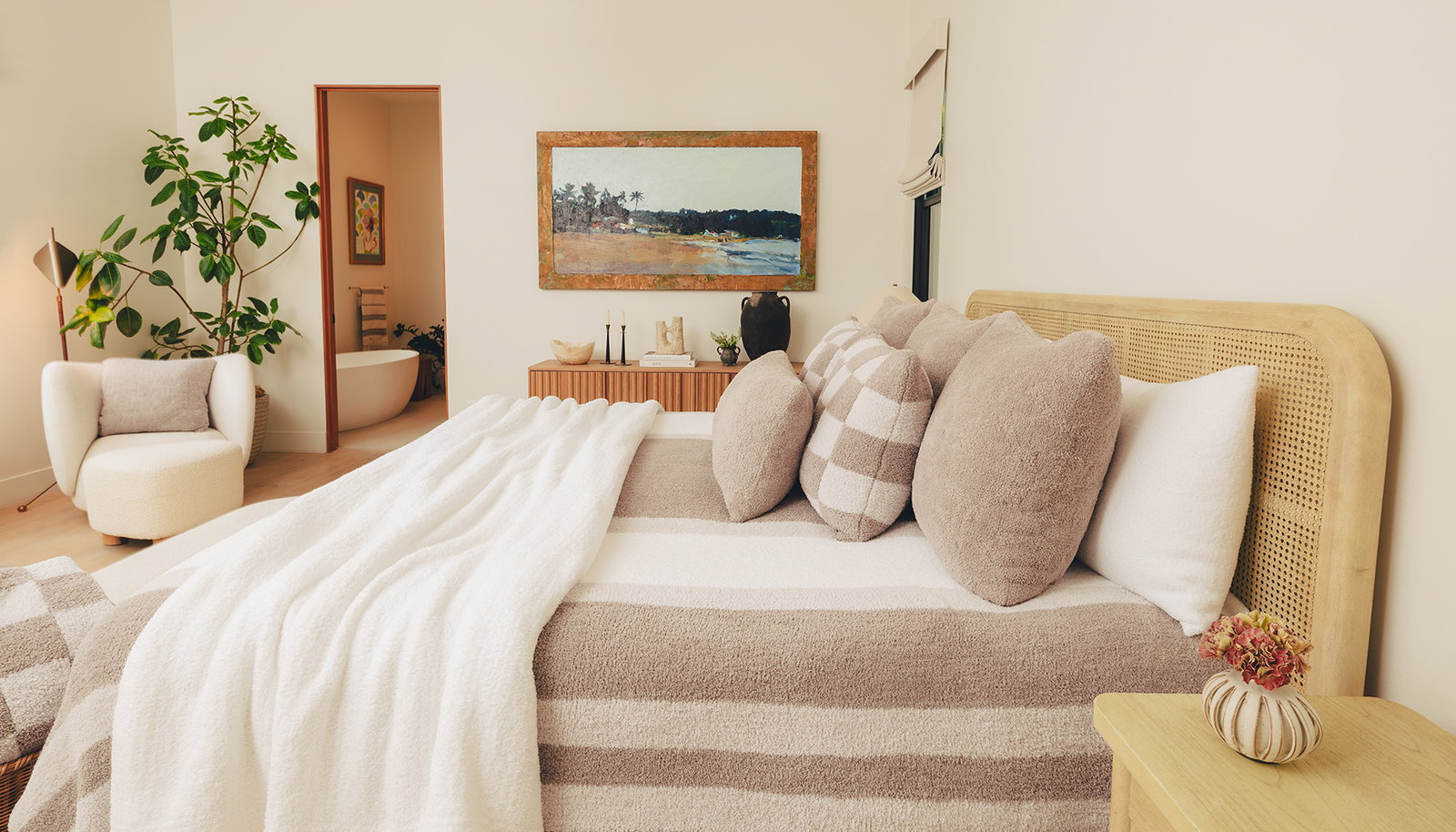 Image of a bed with the Multi Striped King Blanket in Mink / Bone / White Styled