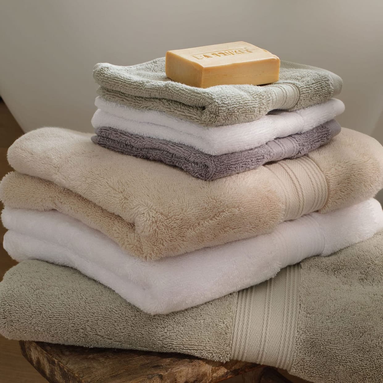 Pile of Egyptian cotton bath towels in Sage green colour