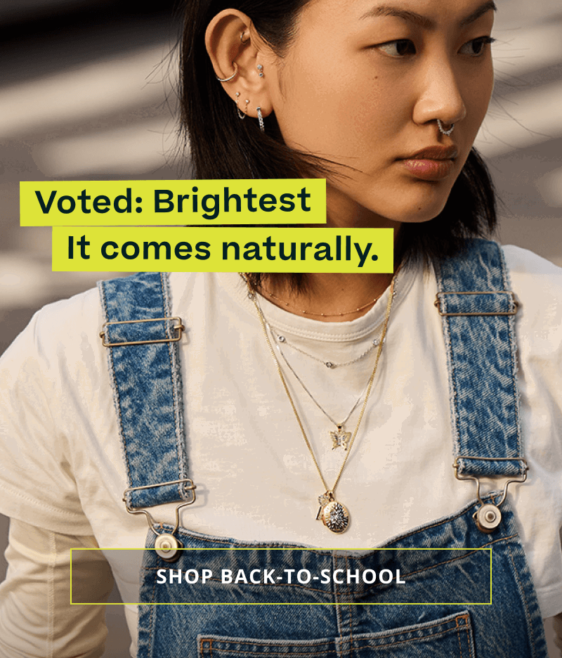 Model with gold layers & ear stack with diamond pendants & accents. Voted: brightest. Click here to shop back-to-school