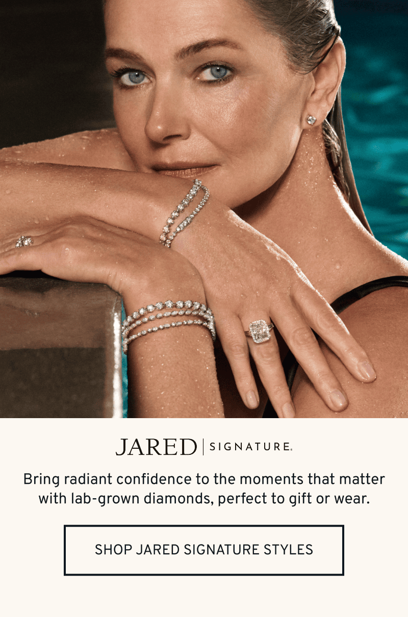Model in pool wearing jewelry. Jared Signature logo. Lab-grown diamonds to gift or wear. Click to Shop Jared Signature Styles