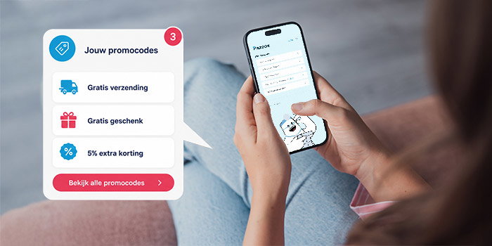 Hands holding smartphone showing shopping app with pop-up listing promo codes: free shipping, free gift, 5% extra discount.