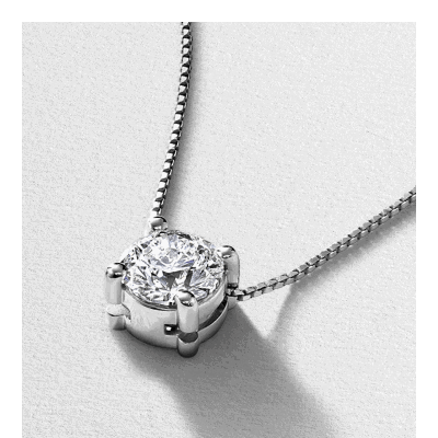 White gold diamond solitaire pendant necklace.