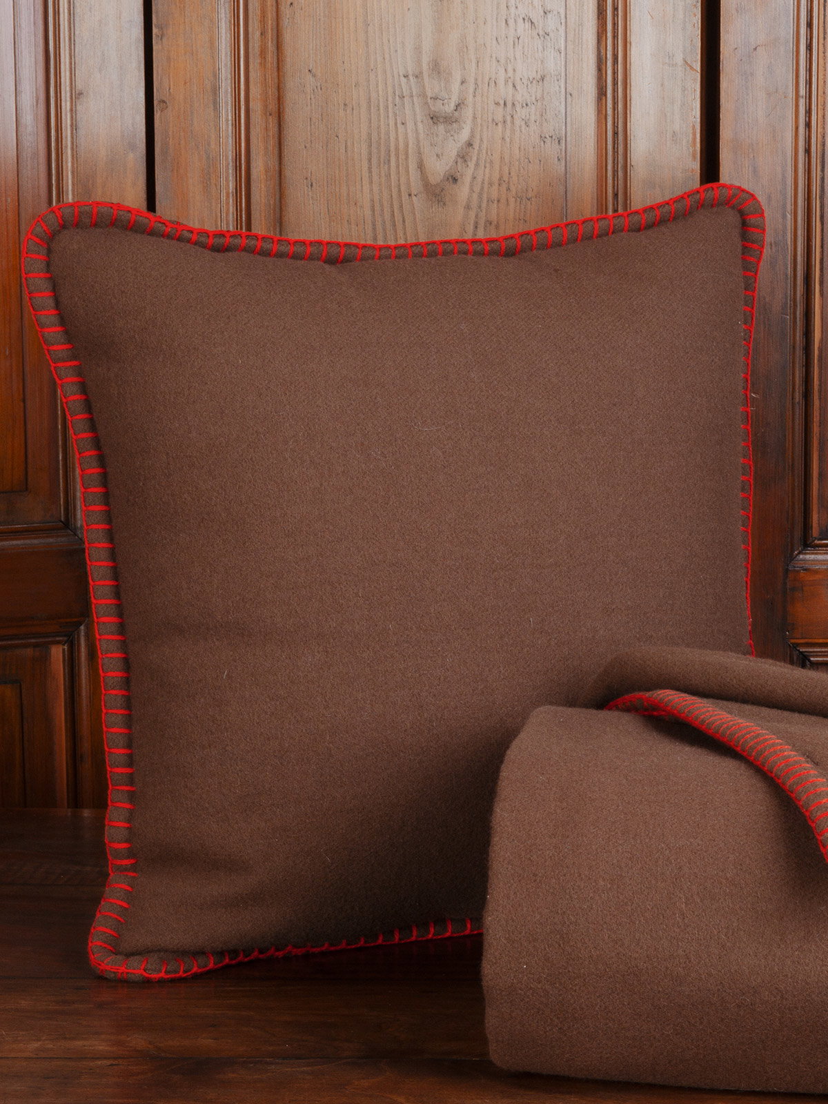 Bilbao Throw & Pillow This Chocolate throw and matching pillow, crafted in Spain from 100% extra fine Australian merino wool