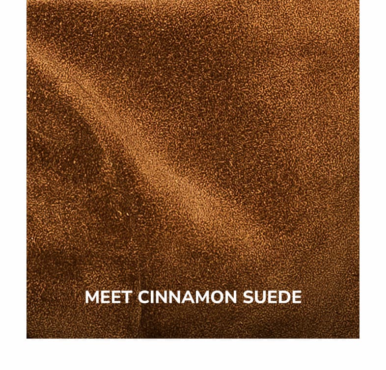 Close-up of the rich Cinnamon Suede material, showcasing the velvety texture and warm toasted-brown color of Hammitt's premium Italian suede.