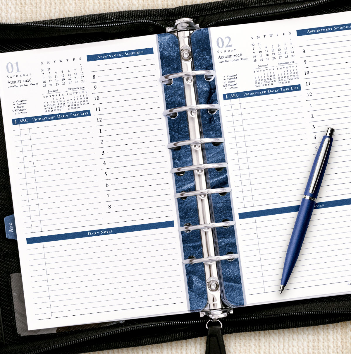 Picture of one page per day planner in ring bound binder.