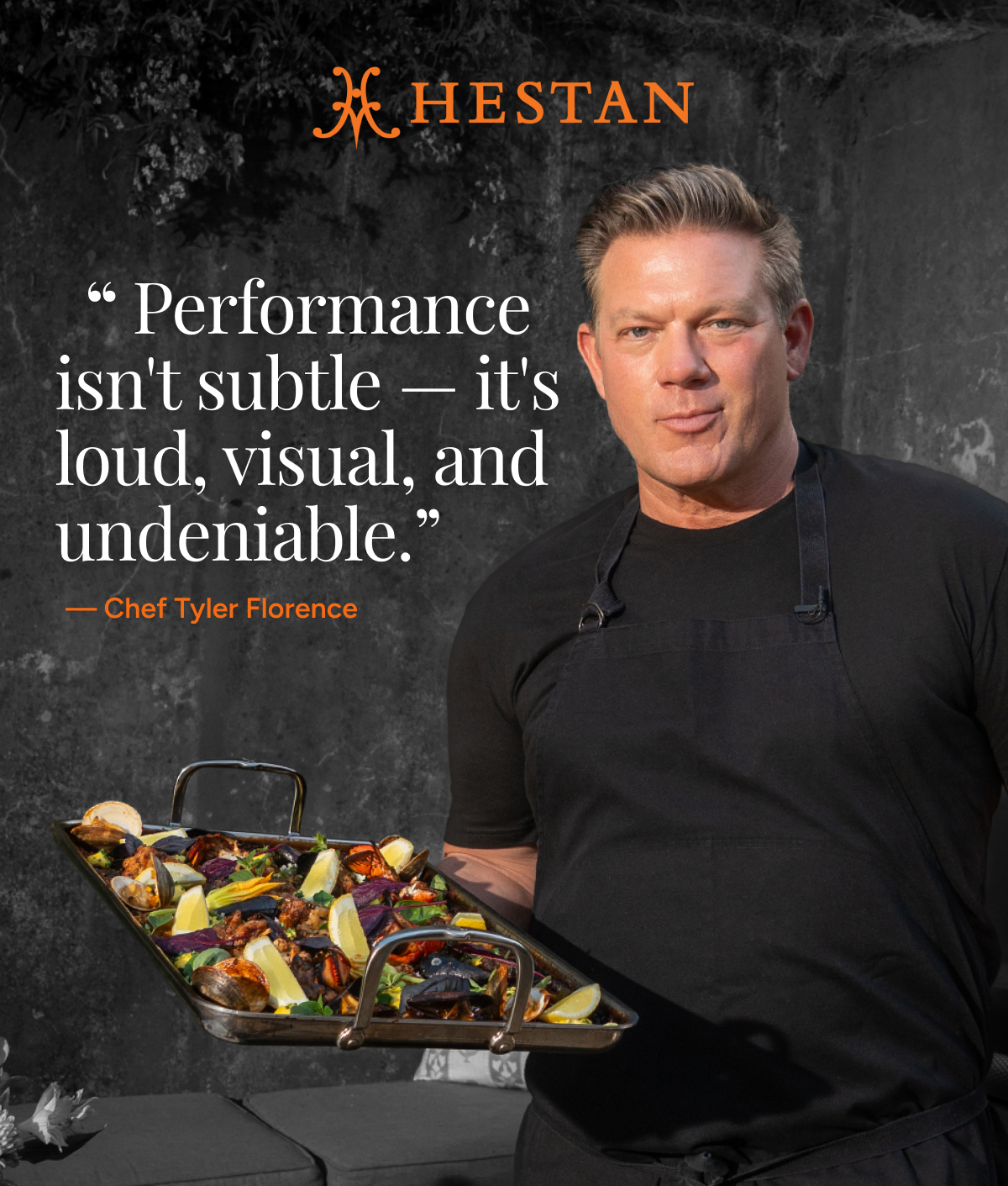 IMG: Chef Tyler Florence holding Paella cooked in Double Burner Griddle. Text that reads: "Tyler’s Favorite On Sale! Now 20% OFF". Hestan logo on top.