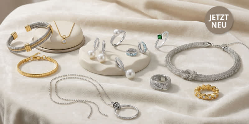 Ein Werbebanner für Schmuck zeigt verschiedene Ringe, Ketten und Armbänder, sowie einen JEZT NEU Störer