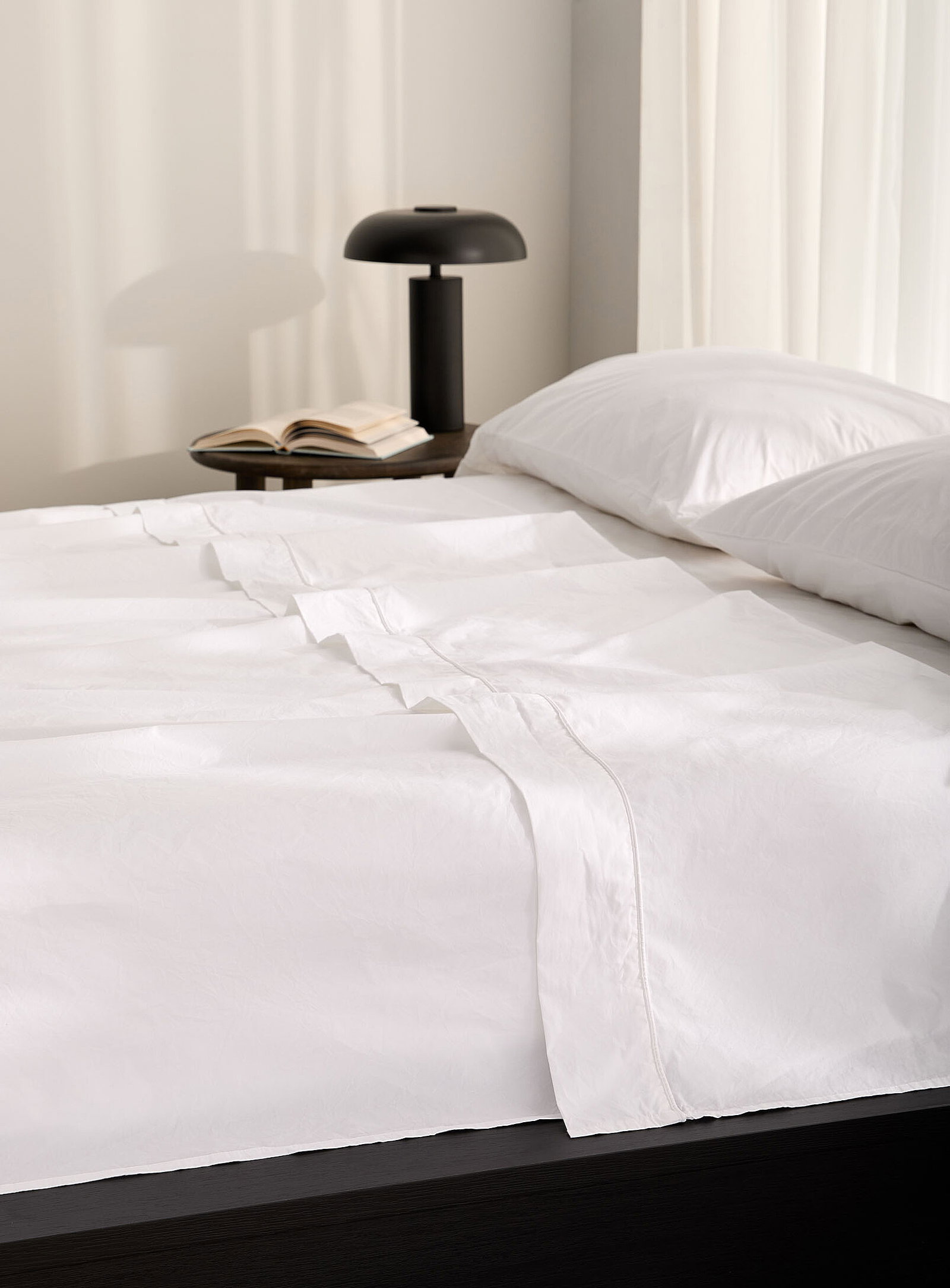 Solid pure organic cotton sheet<br>300-thread-count<br>Fits mattresses up to 16 in