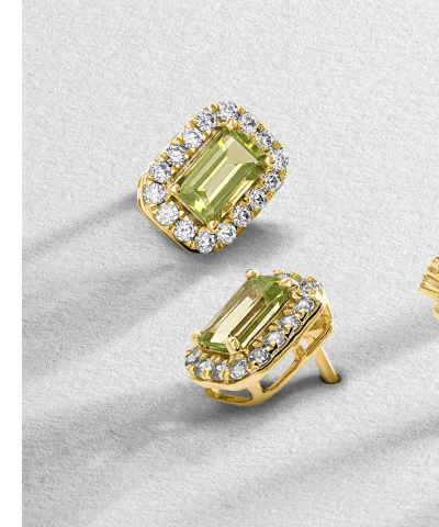 Yellow gold green peridot and diamond halo stud earrings.