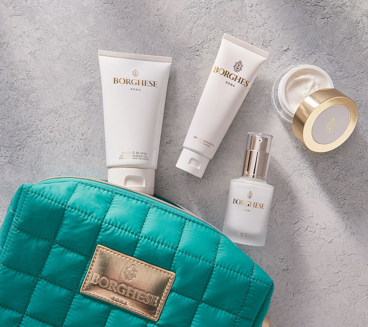 Product shot of Borghese Travel Cosmetic Bag, Bagno di Vita Travel-Size, Crema Saponetta Creme Cleanser Travel-Size, Curaforte Moisture Intensifier Travel-Size, Crema Ristorativo-24 Moisturizer Travel-Size
