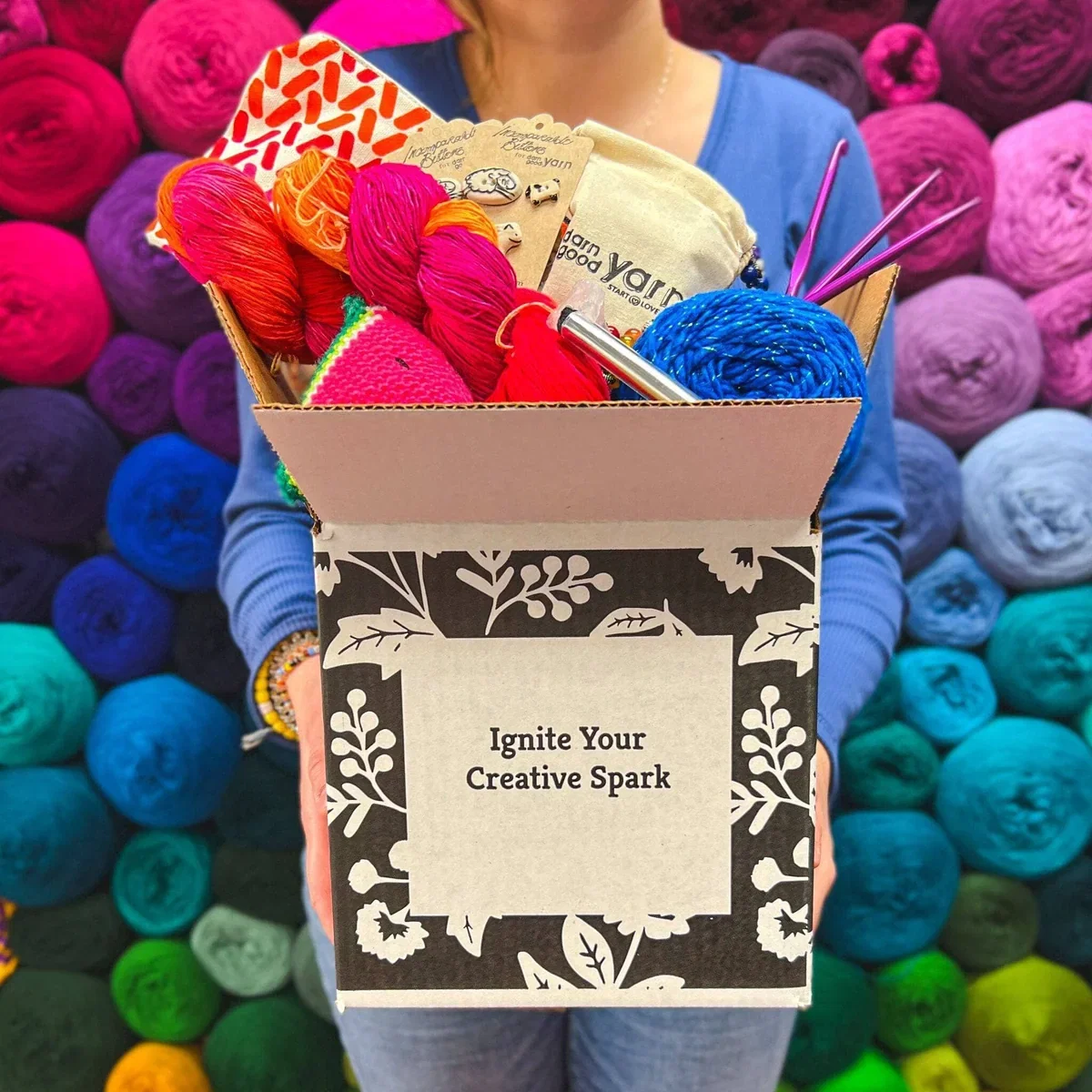 A box of colorful recycled sari silk yarn