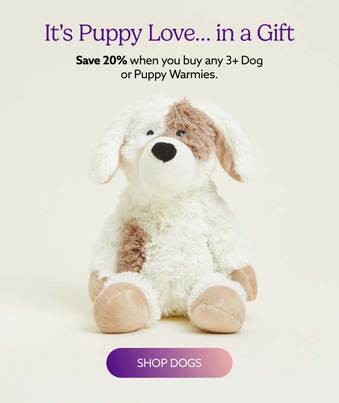 Puppy Warmies on a beige background. Shop Dogs.