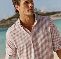 Man in blue and orange gingham sport shirt.
