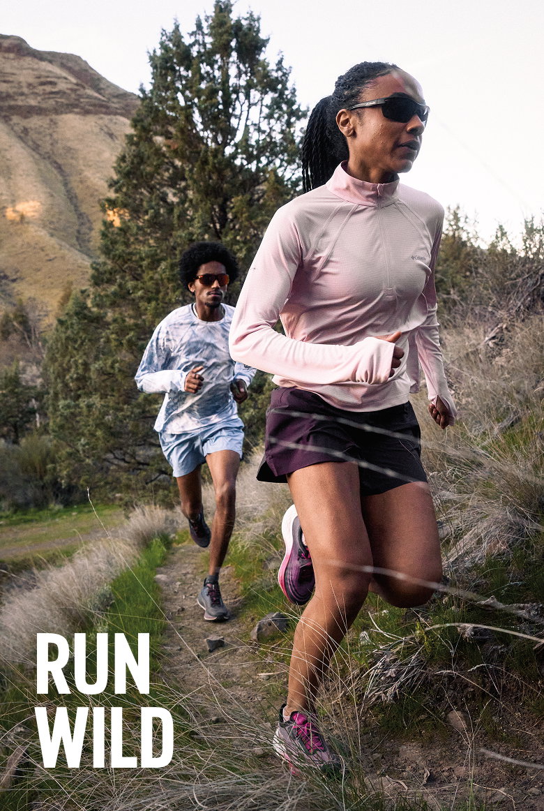 Two runners on a wooded trail with headline RUN WILD.