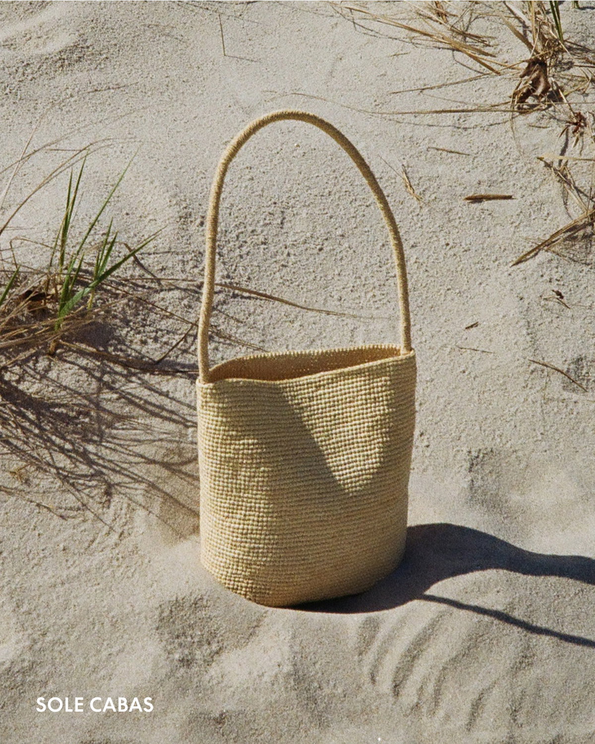 Created in partnership with a small, female-founded nonprofit organization, this capsule supports artisan employment, children's education, rainforest regeneration, and wildlife conservation in Madagascar. Available exclusively at mansurgavriel.com in limited quantities.