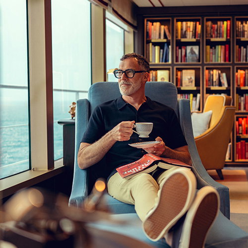 A man enjoying quiet time in the library