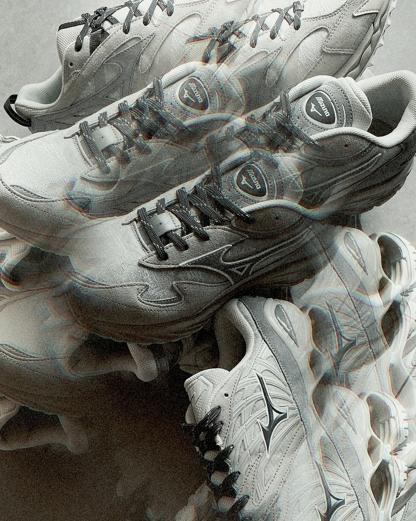 Stacked grey Mizuno running shoes with black laces and textured sole, artistic smoke/glitch overlay, top-down product view