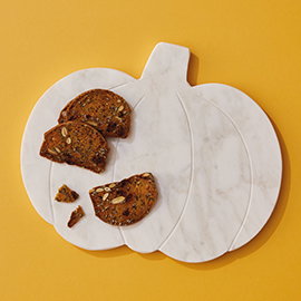 Pumpkin-shaped serving board.