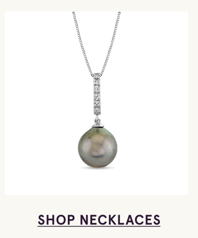 Silver pendant with iridescent Tahitian pearl with vertical bar of diamonds. Click here to shop necklaces