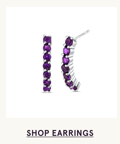 Silver ear climbers set with a vertical row of purple amethyst gemstones. Click here to shop earrings