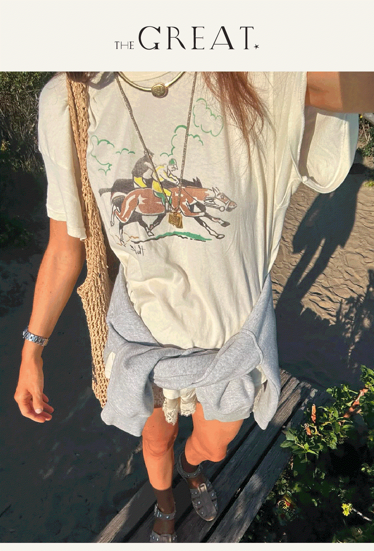 An assortment of THE GREAT. tees and sweatshirts worn by various women in a rotating GIF of images. 