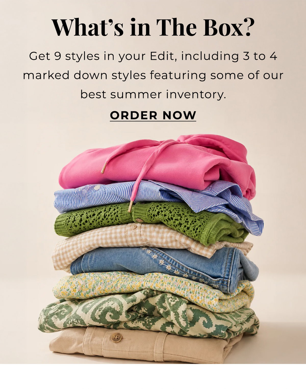 Folded summer clothing in bright colors and patterns for an End of Season Sale.