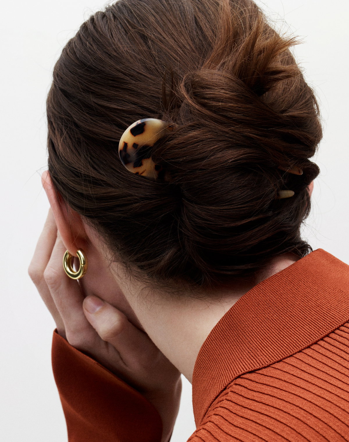 Machete hair clip worn in an updo