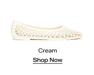 A side view of the Jelly Shoe in Cream. Shop Now.