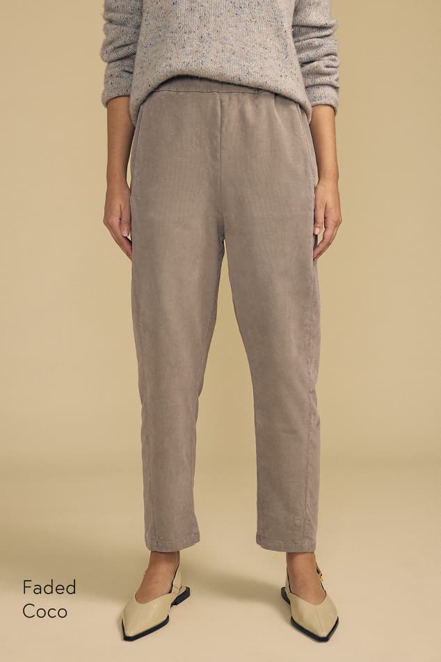 Image shows a model wearing the Laney Pants in Faded Coco.