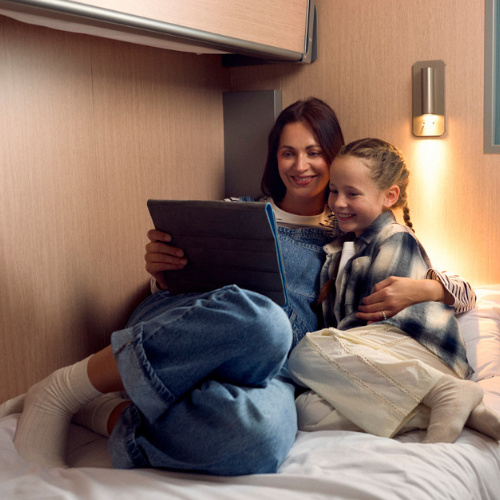 mum and daughter in cabin