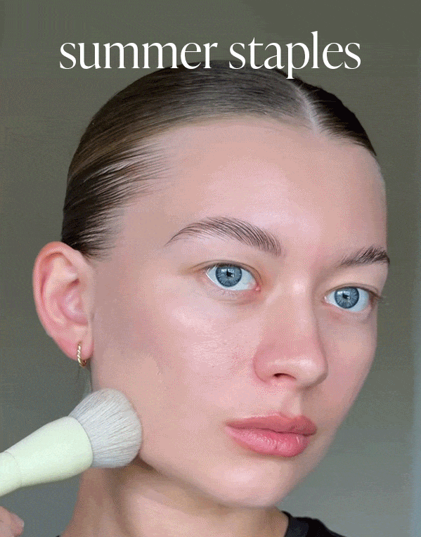 summer staples model applying makeup 